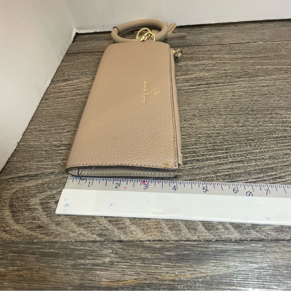 Nanette lepore Tan Clutch with Tassel Accent wristlet. Small flaw on corner - Picture 9 of 9
